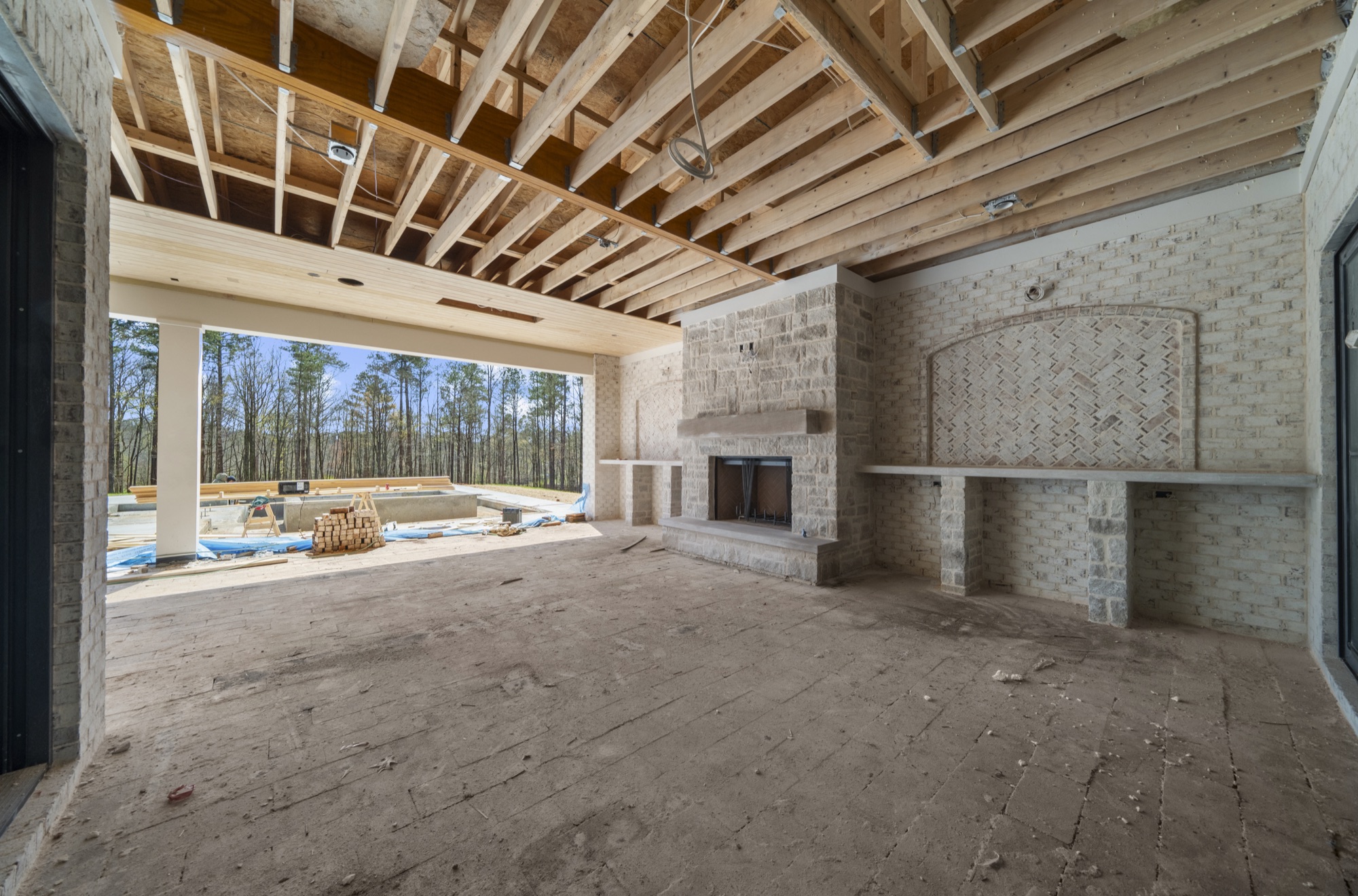 Covered outdoor room with fireplace